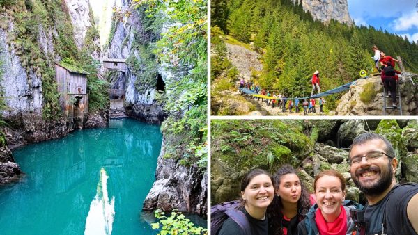 Grup de turisti pe traseul din Cheile Zanoagei, langa Lacul Bolboci si Cascada 7 Izvoare, inconjurati de paduri de conifere si peisaje spectaculoase din Muntii Bucegi.